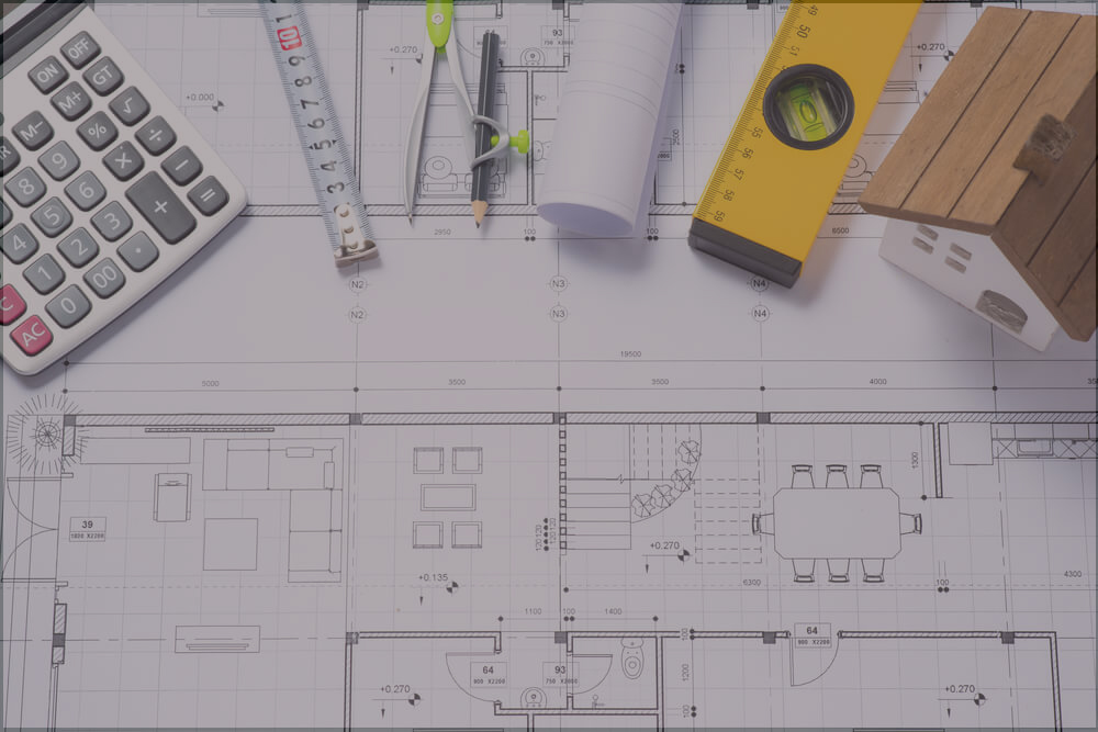 floor plans in works with rulers and pencils